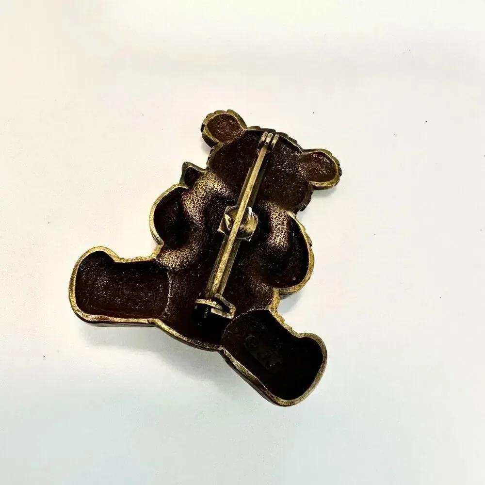 Jeanette Jewelry Gold and  Silver tone Bear holding a heart brooch
